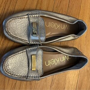 Calvin Klein gold loafers